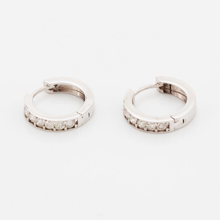 Brilliant-cut diamond  hoop earrings.