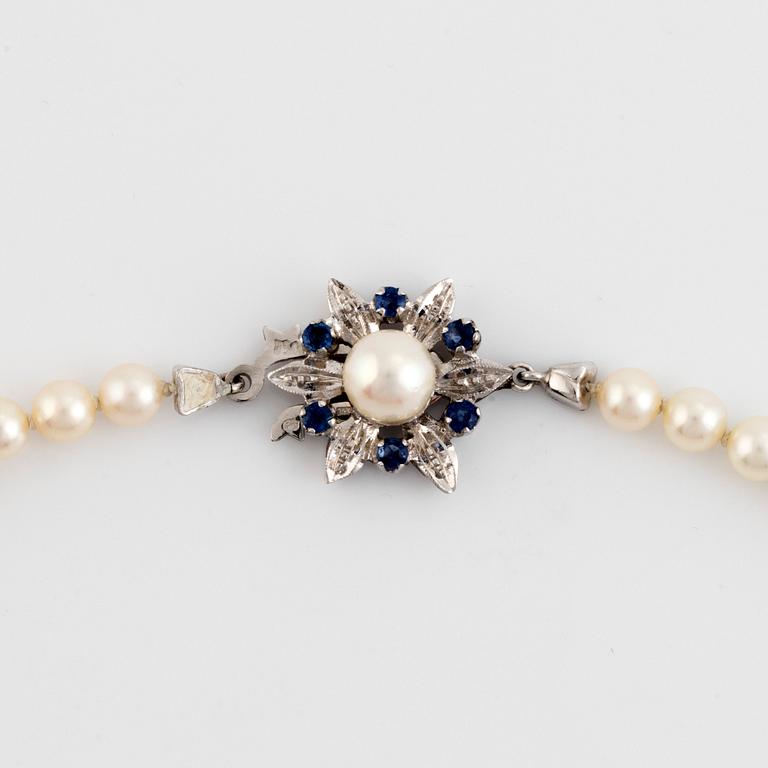 Cultured salt water pearl necklace, 18K white gold and sapphires.