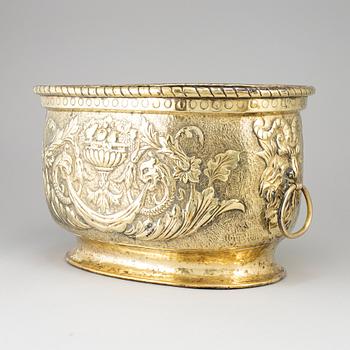 An 18th century brass champagne cooler.