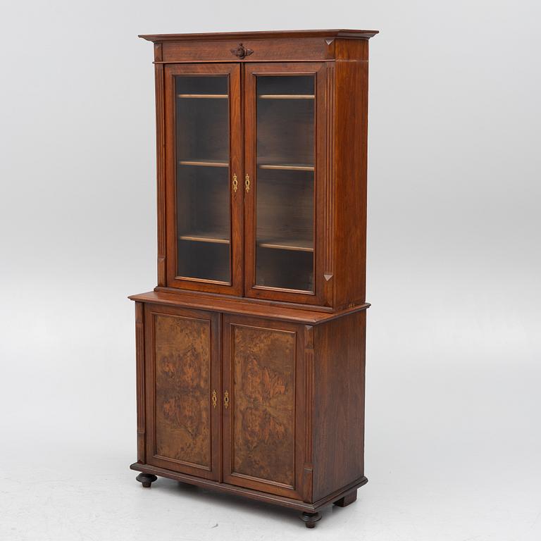 A two part mahogany cabinet, around 1900.