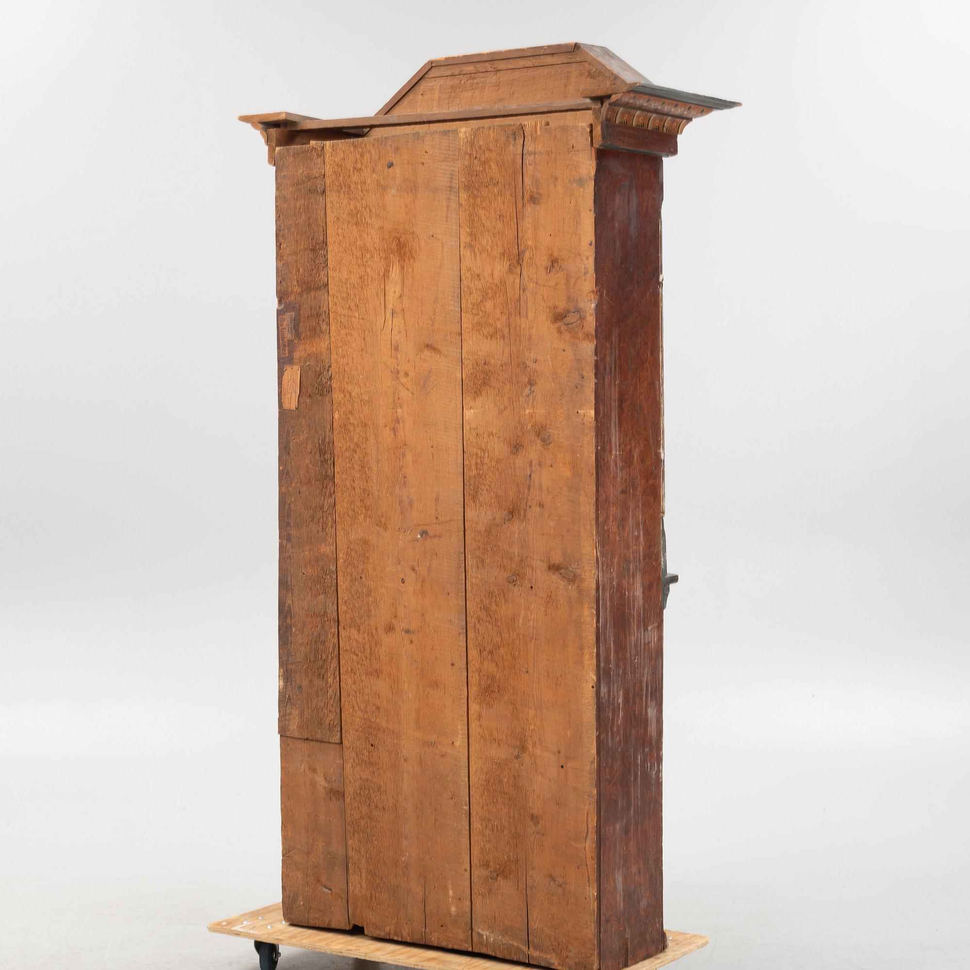 A Swedish traditional painted cabinet, dated 1819.