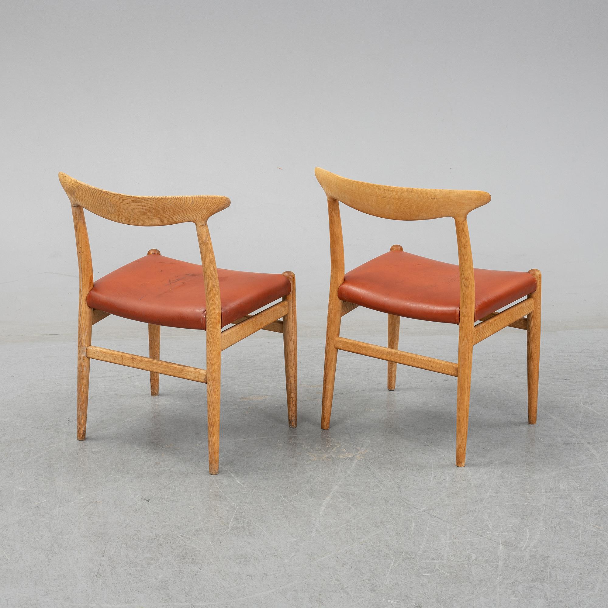 Six model W2 oak chairs by Hans Wegner for C.M. Madsen, designed 1953.