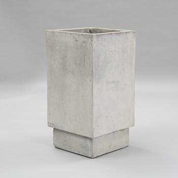 A contemporary concrete flowerpot.