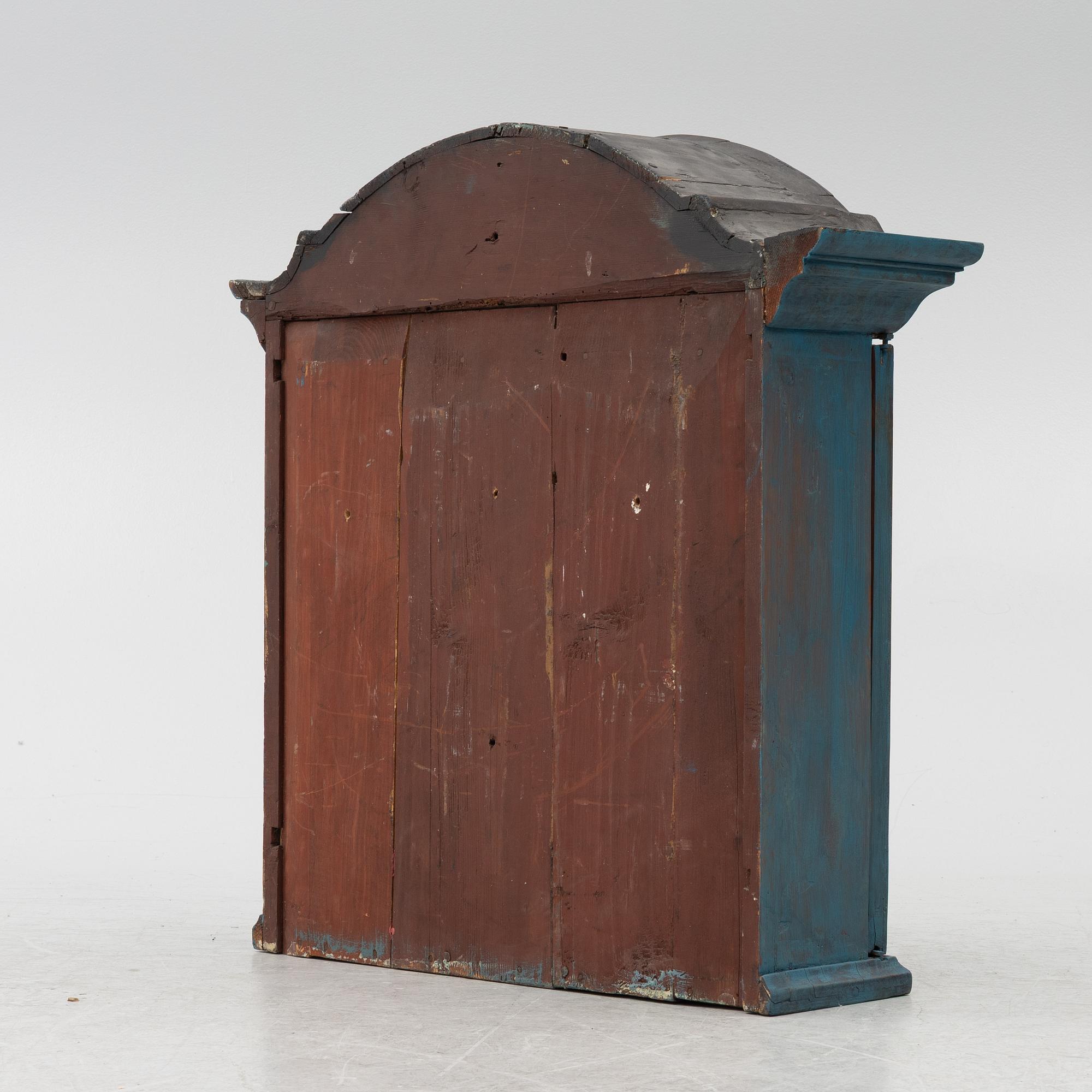 A wall cabinet, 18th century.