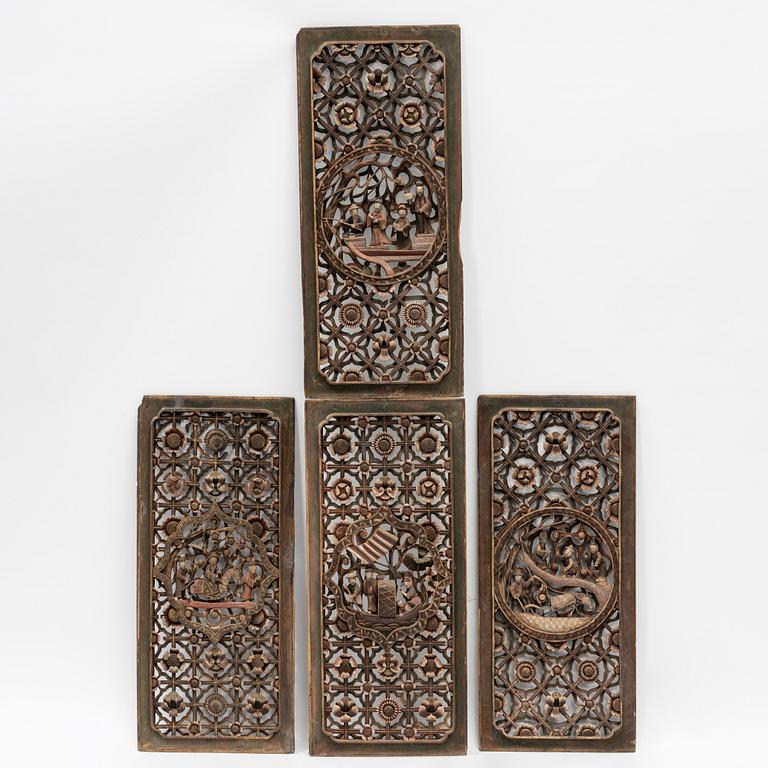 Four carved panels, China, 20th century.