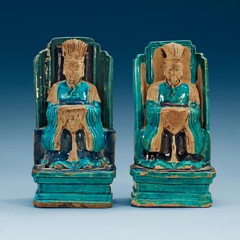 Two turquoise and purple glazed figures of daoistic dignitaries, Ming dynasty, 17th Century.