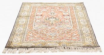 A rug, silk Quum, ca 174 x 103 cm.