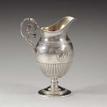 A Swedish 19th century parcel-gilt cream-jug, marks of Magnus Fryberg, Jönköping 1825.