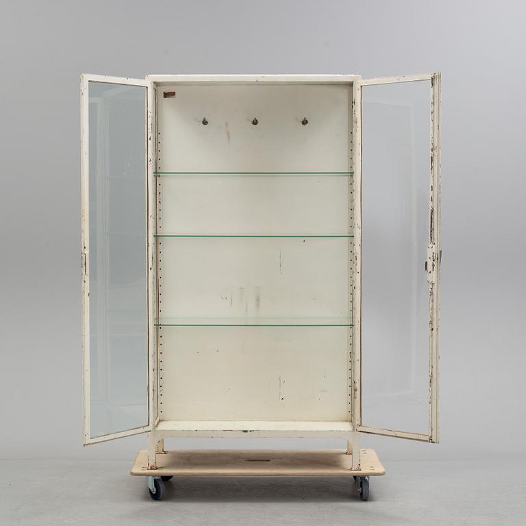 A mid 20th century metal display cabinet.