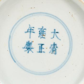 A blue and white dish with a red four clawed dragon, Qing dynasty (1644-1912), with Yongzheng six character mark.
