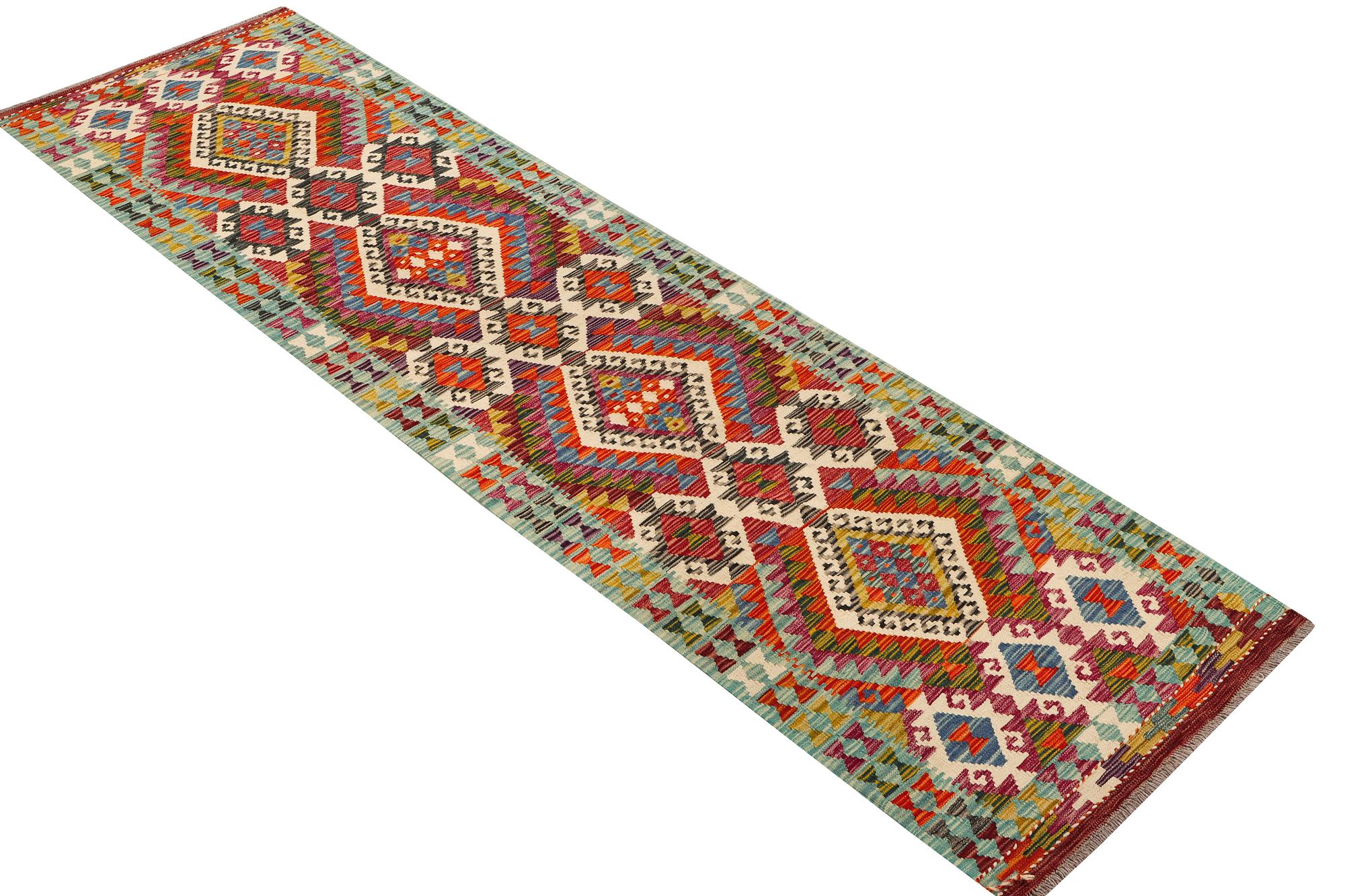 An Afghan kilim runner, c. 294 x 82 cm.