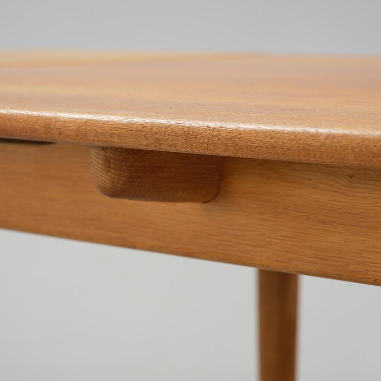 Hans J. Wegner, an "AT-312" dining table, Andreas Tuck, Denmark, 1950s-60s.