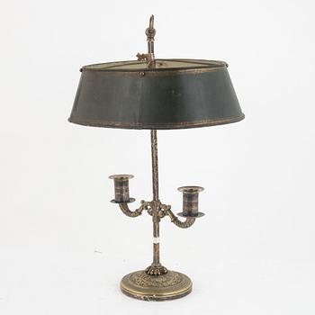 A French Empire silvered-bronze and tôle-peinte two-light reading light, early 19th century.