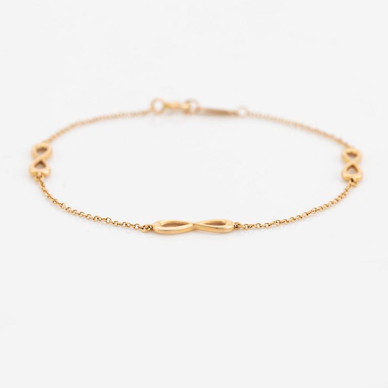 Tiffany & Co, an 'Infinity Endless' 18K bracelet.