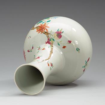 A famille rose vase, China, Republic, 20th Century, with Qianlong four character mark in red.