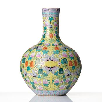 A large Chinese famille rose yellow ground vase, 20th Century with Qianlong mark.