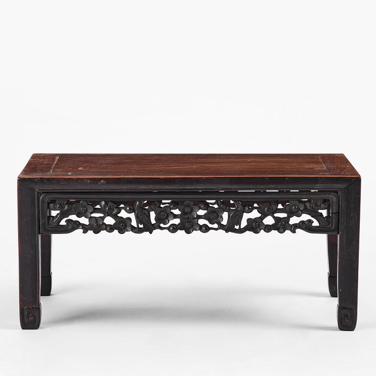 A Chinese hardwood kang table, late Qing dynasty.