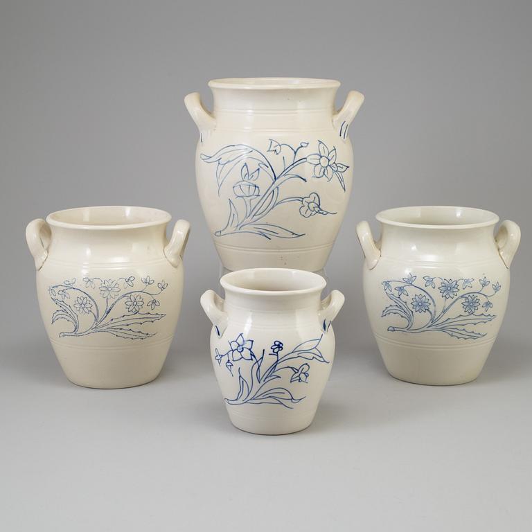 A set of four 20th century blue and white jars by Rörstrand.