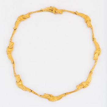 An 18K gold Lapponia necklace design Björn Weckström.