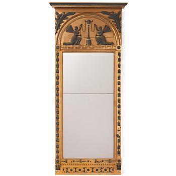 A late Gustavian giltwood and patinated mirror attributed to J. Frisk (master in Stockholm 1805-24).