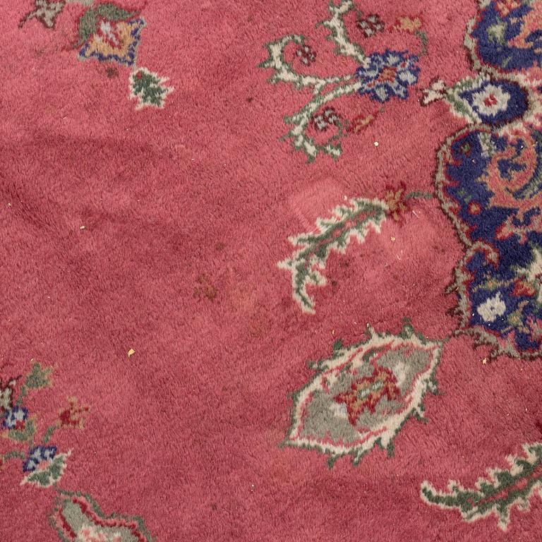 An oriental/eastern European carpet, c. 355 x 275 cm.
