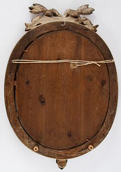 A Gustavian two-light girandole mirror, Stockholm, late 18th century.