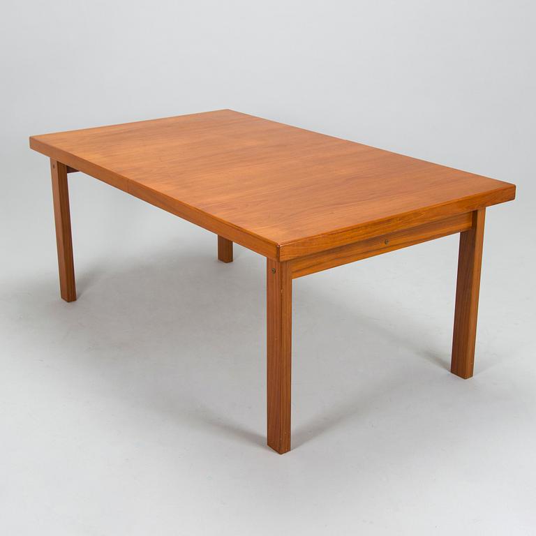 A mid-20th century dining table.