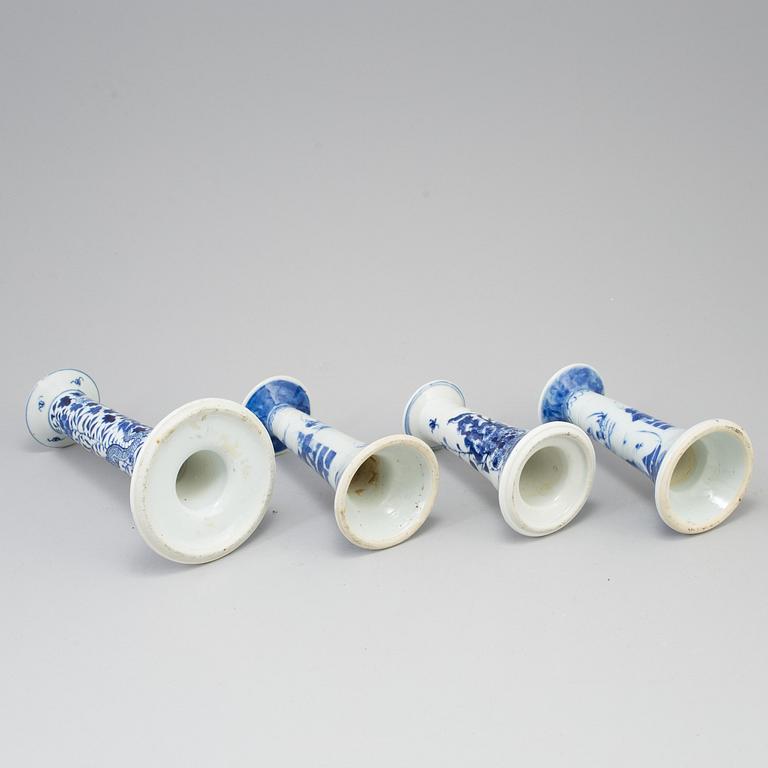 Four chinese 19th century blue and white porcelain candle holders. Qing dynasty.