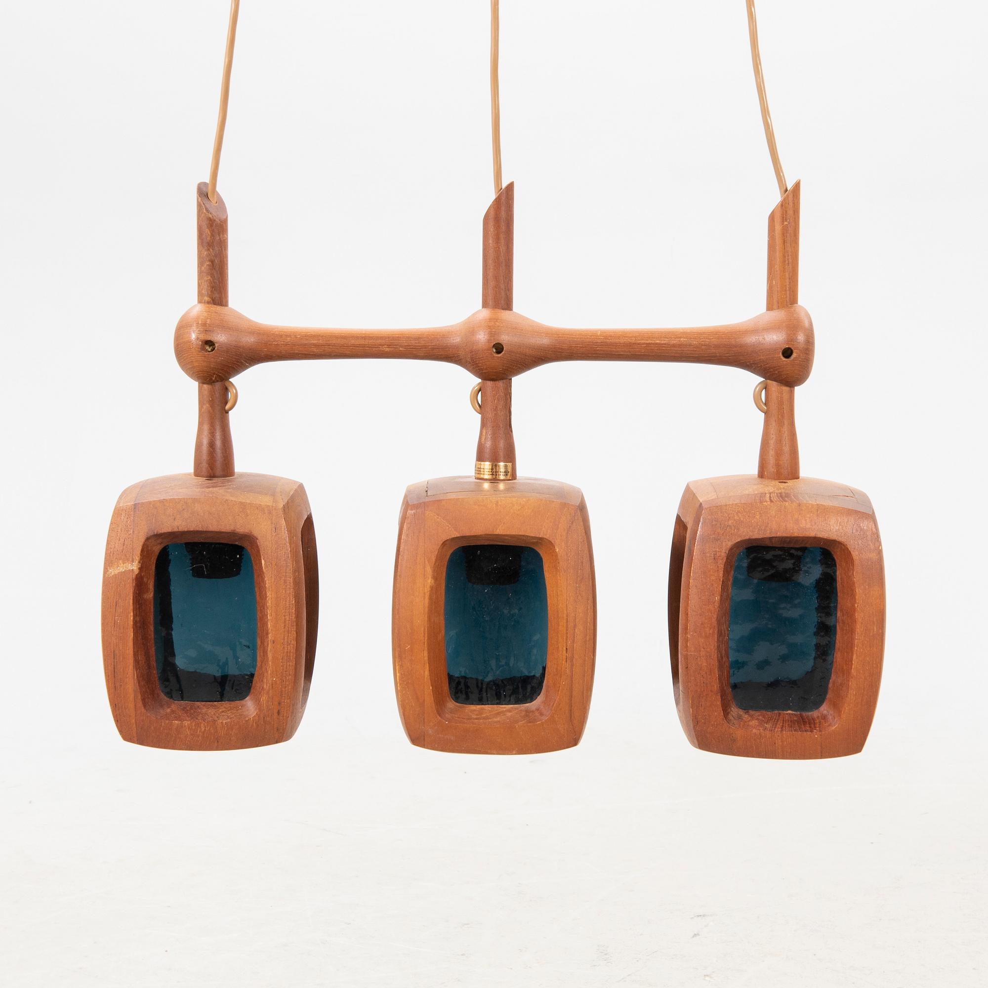 A 1960s teak ceiling pendant from Stilarmatur Tranås.