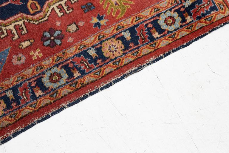 A semi-antique Kurdish runner, 350 x 140 cm.