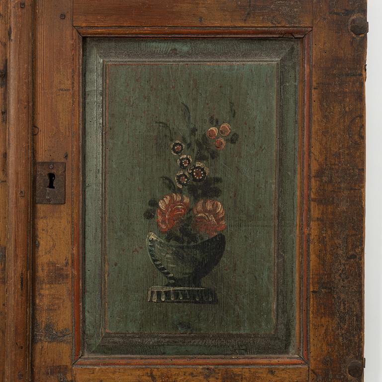 A pair of folk-art cabinet doors mounted as a painting, first part 19th century.