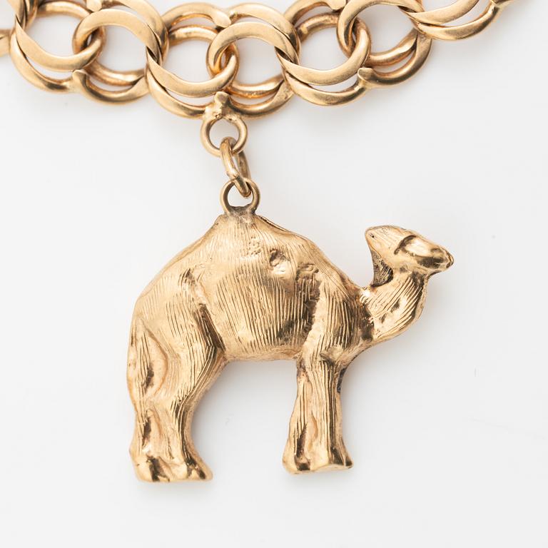 Armband 18K guld bismarcklänk, med berlocker.