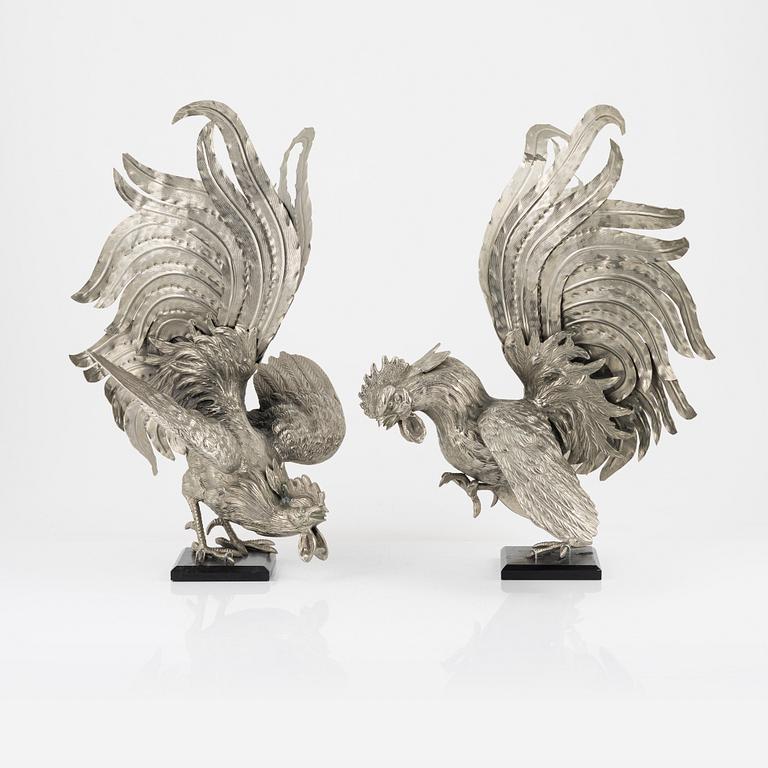 A pair of metal table decorations, 20th century.