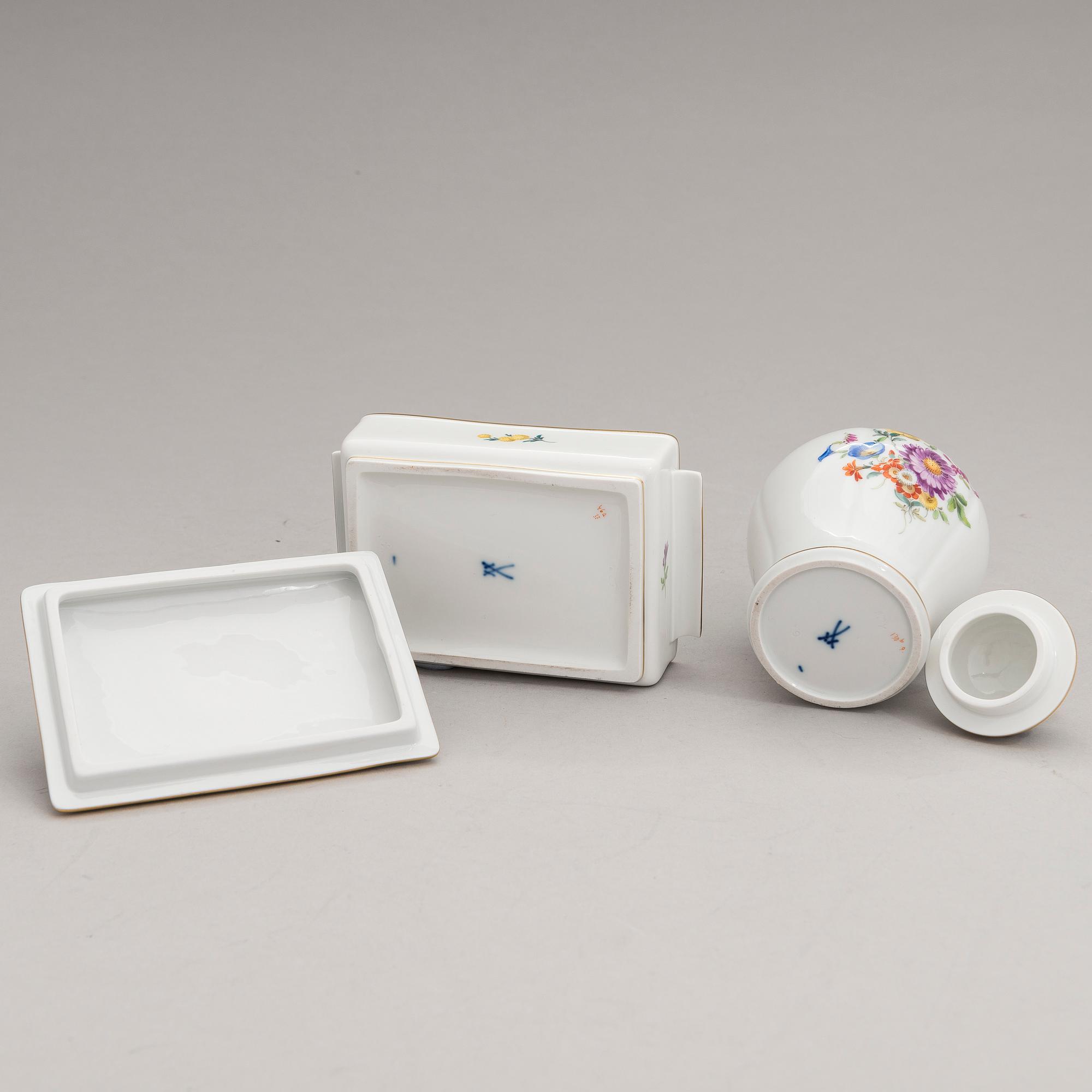 Two Meissen porcelain vases, a platter, an urn and a lidded box from the latter half of 20th century.