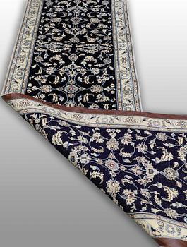 A Nain runner, part silk, approx. 294 x 90 cm.