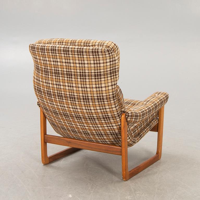 An Inge Andersson walnut "Draken" easy chair late 1960s.