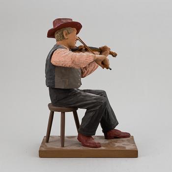 HERMAN ROSELL, a painted wooden sculpture.