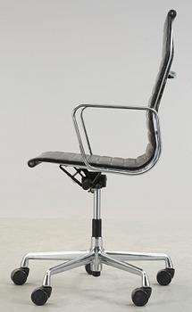 A Charles & Ray Eames 'Aluminium group' office chair, Vitra, model EA 119.