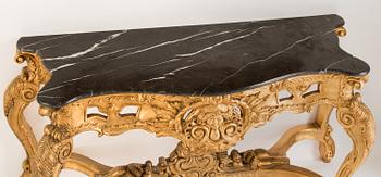 A later part of the 20th century mirror and consol table.