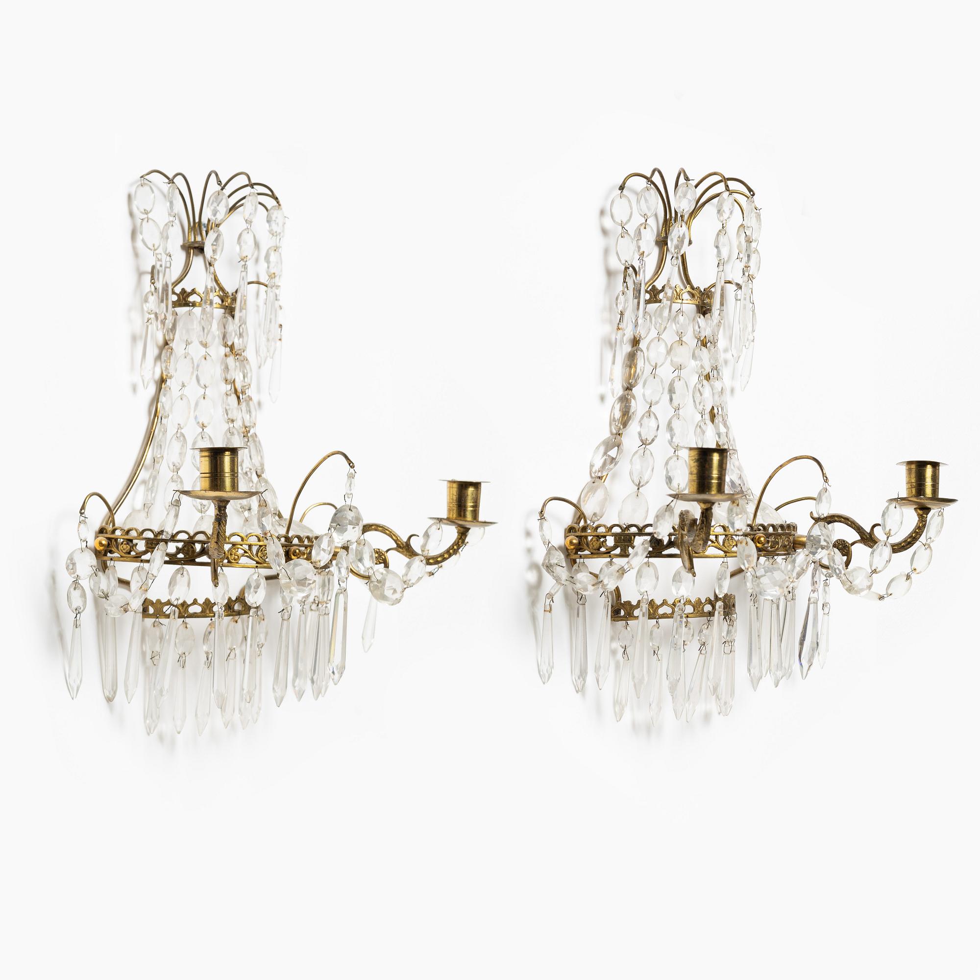 A pair of Empire style wall sconces, mid-20th Century.