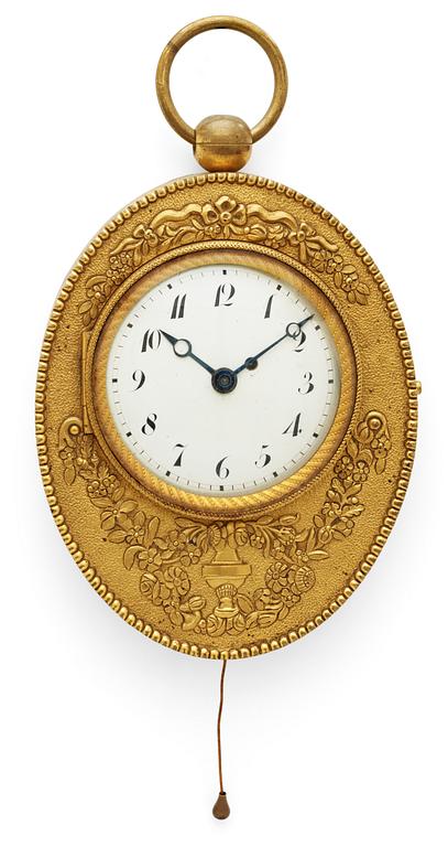 An Empire early 19th century gilt bronze carriage clock.