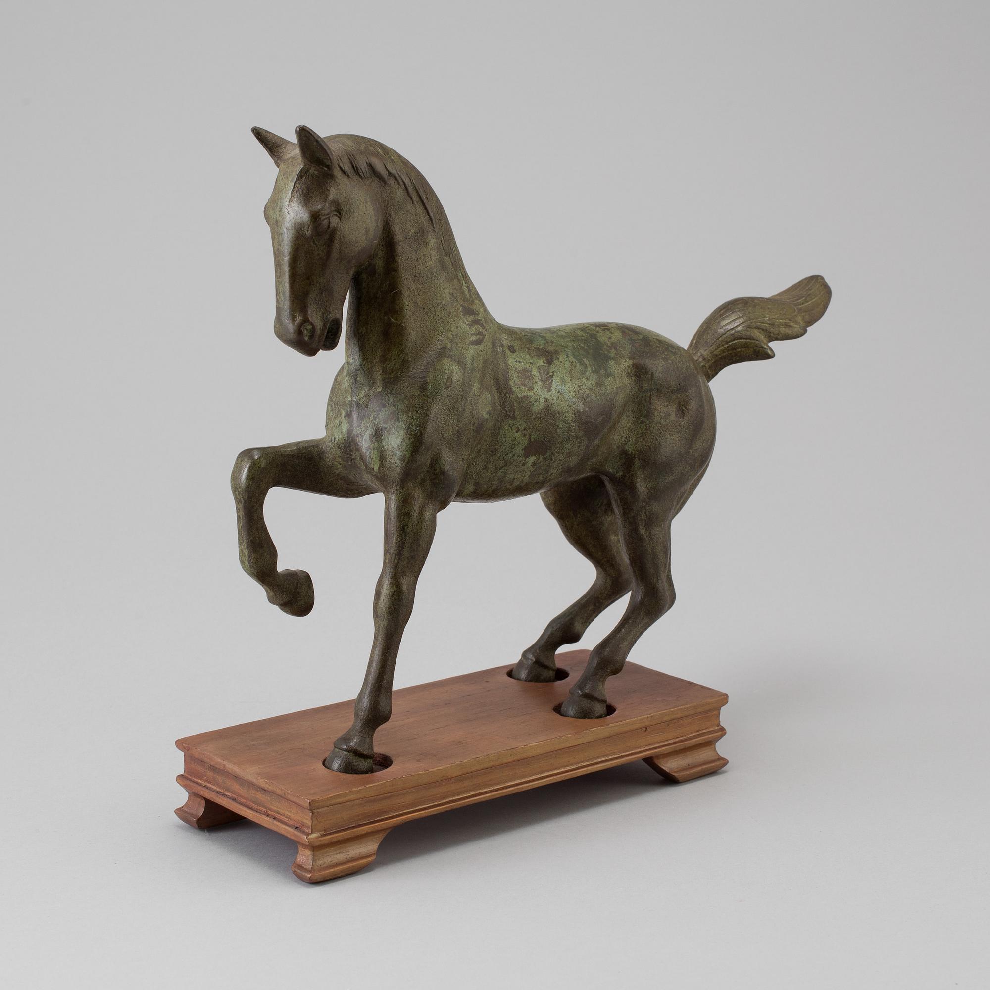 A late 20th century bronze sculpture.