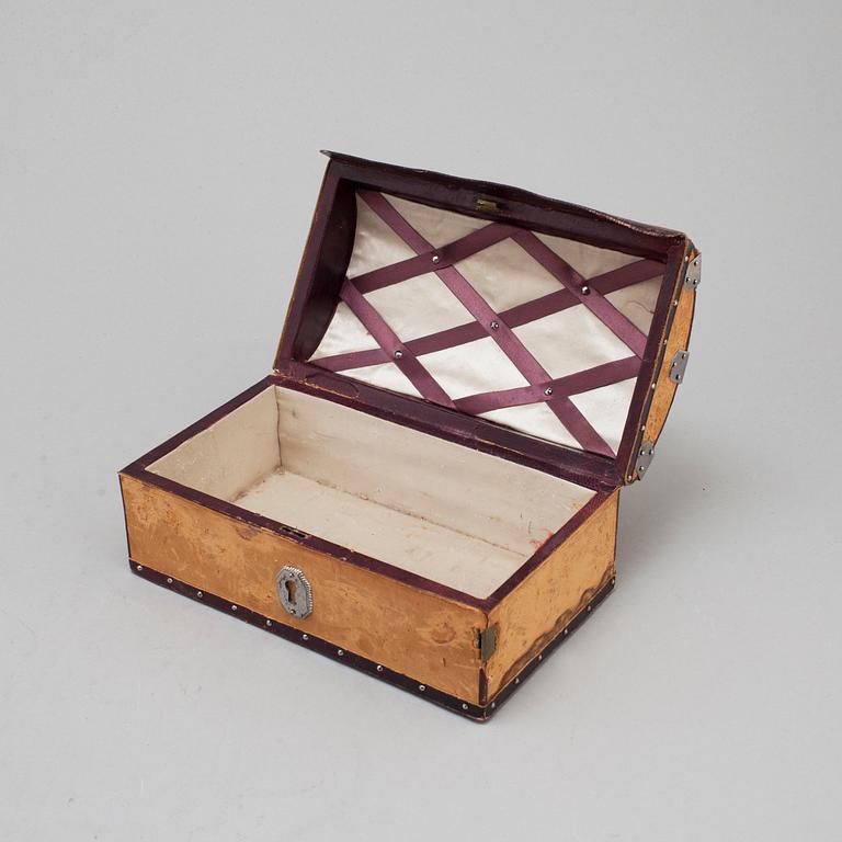 19th century leather box with steel decorations.