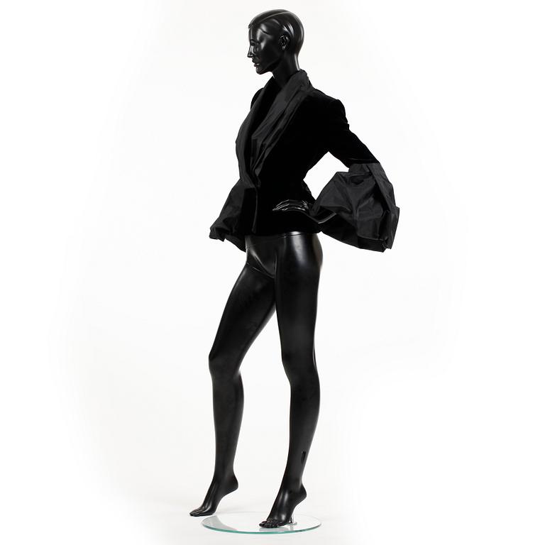 ARMANI, a black velvet evening jacket with silk details.