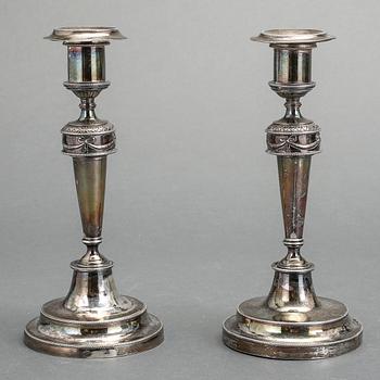 LJUSSTAKAR, ett par, silver, oidentifierade stämplar, omkring 1900.