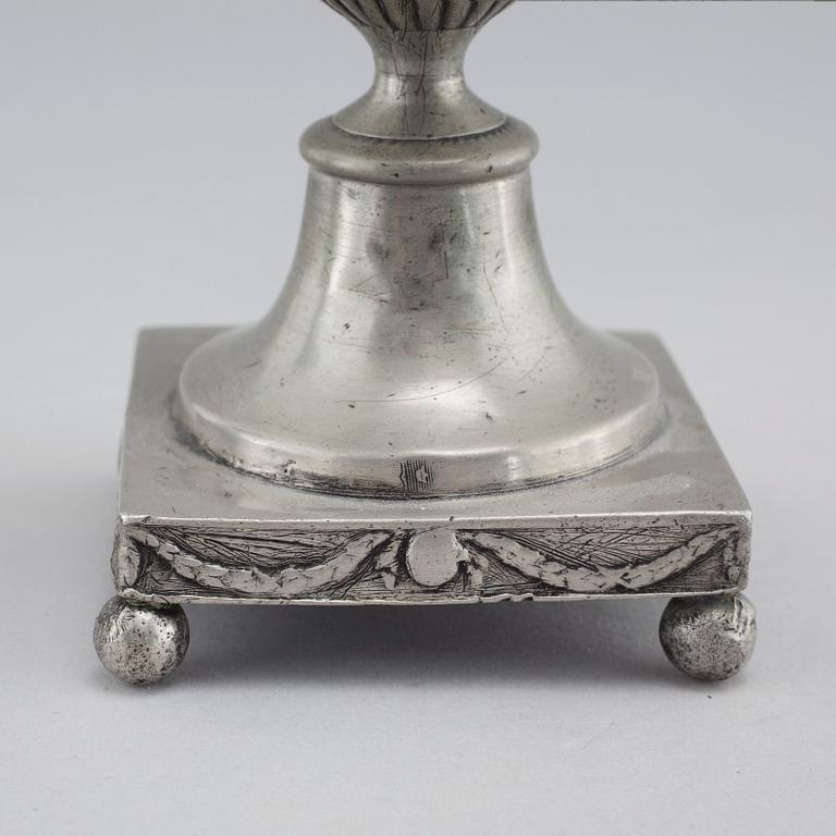 A pair of pewter candlesticks by Adolf Fredrik Moberg in Jönköping, 1824.