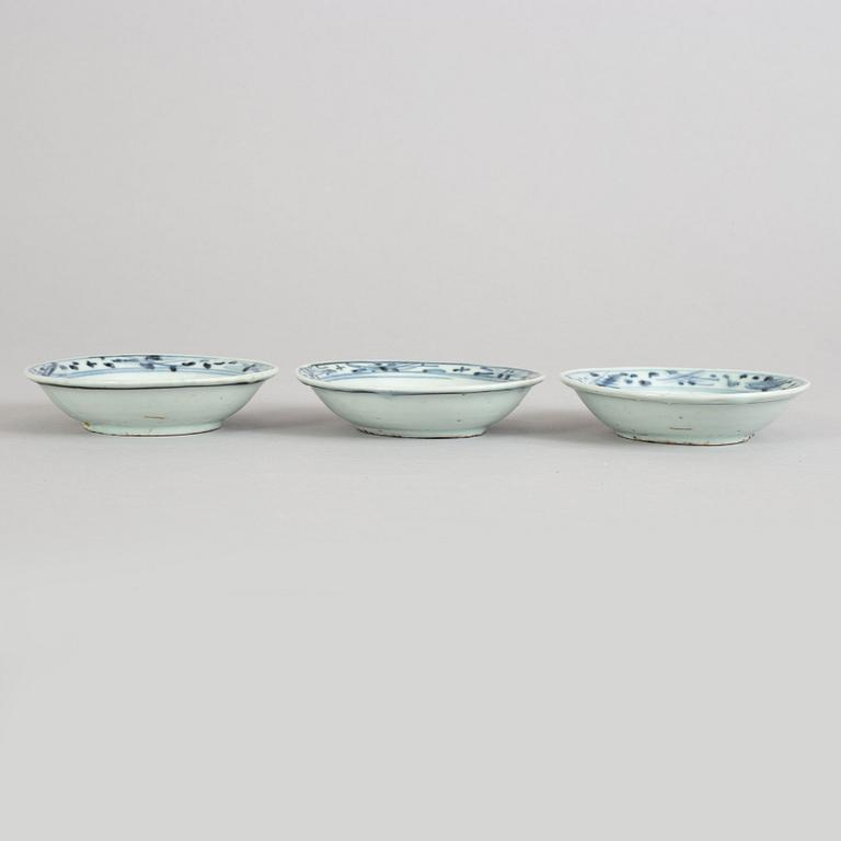 A set of three small blue and white dishes, Ming dynasty (1368-1644).