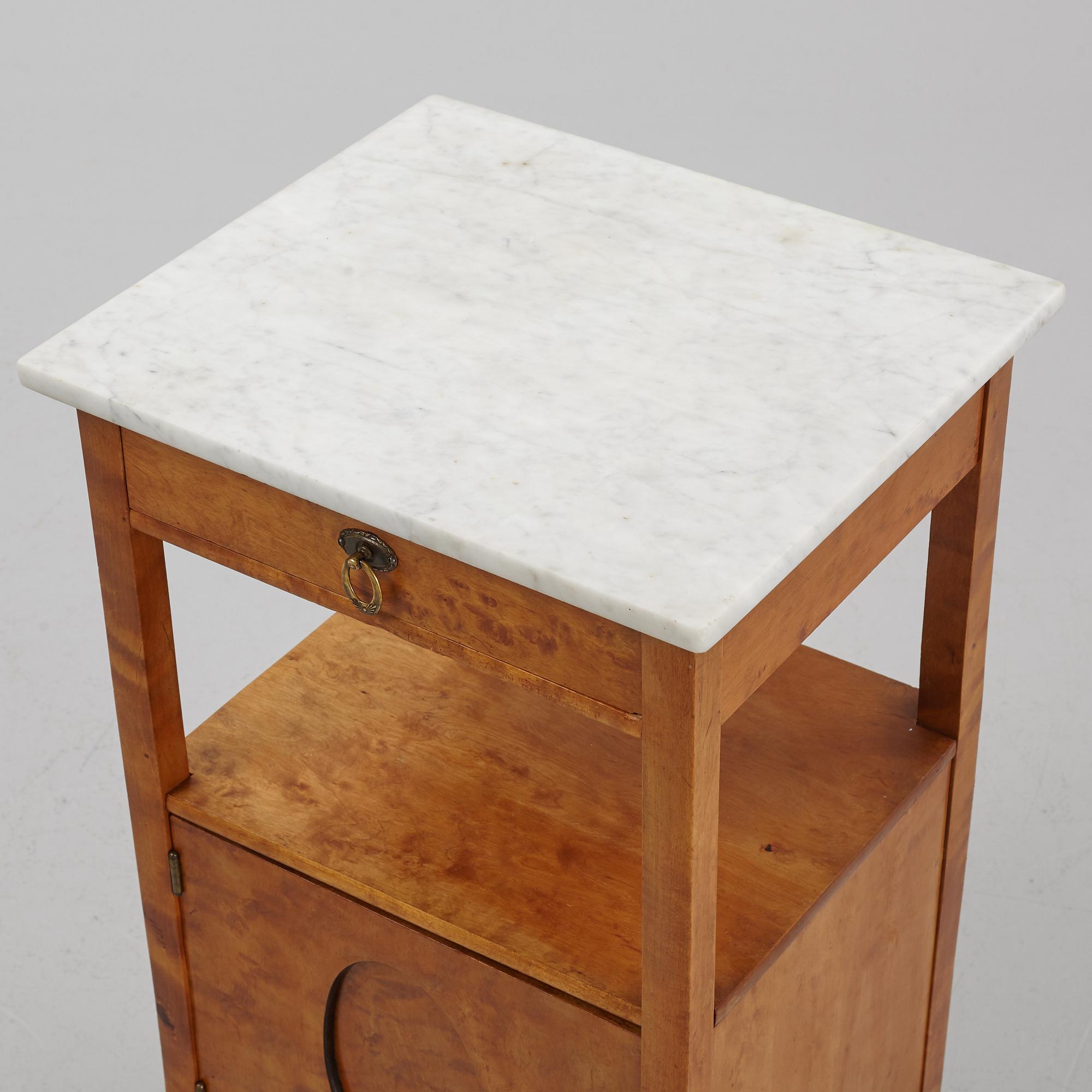 A bedside table, early 20th Century. - Bukowskis