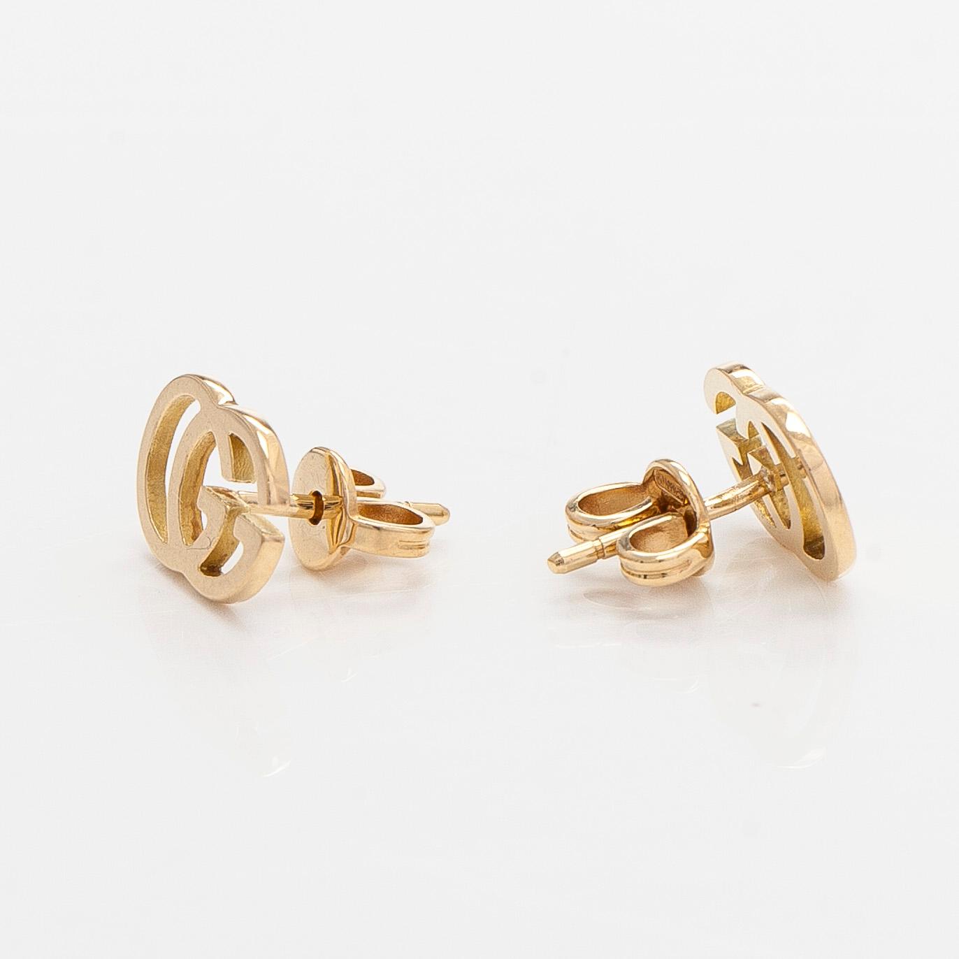 Gucci, a pair of 18K gold "GG Running" earrings.
