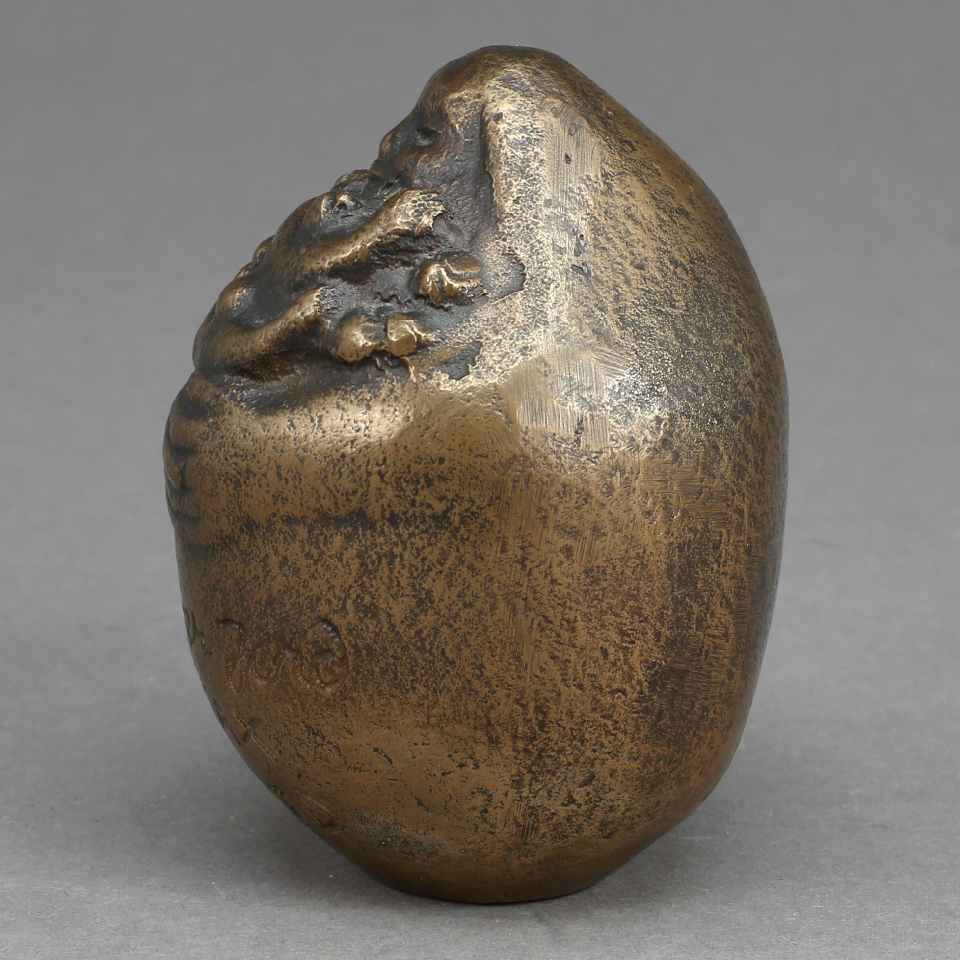 DAVID WRETLING, skulptur, patinerad mässing, "Moder Jord", signerad och daterad 1969.